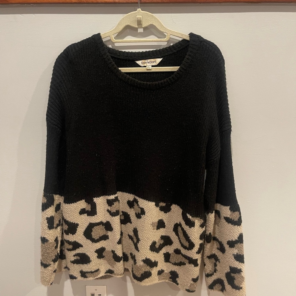 Women’s black cheetah sweater